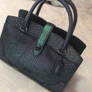 Coach hologram 24 mercer
